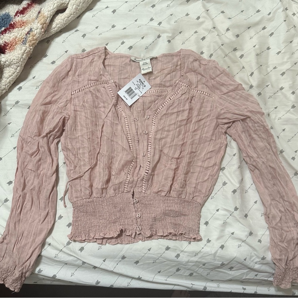Pink long sleeve blouse